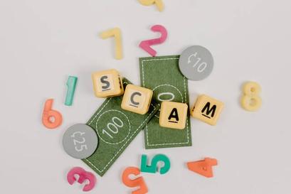 Cash Building System image of letters spelling the word SCAM